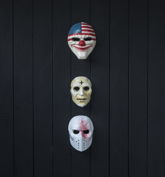 疯子面具孤立在黑色背景图片下载