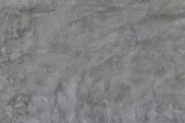 垃圾混凝土墙，有划痕和污渍。水泥纹理设计和背景。图片下载