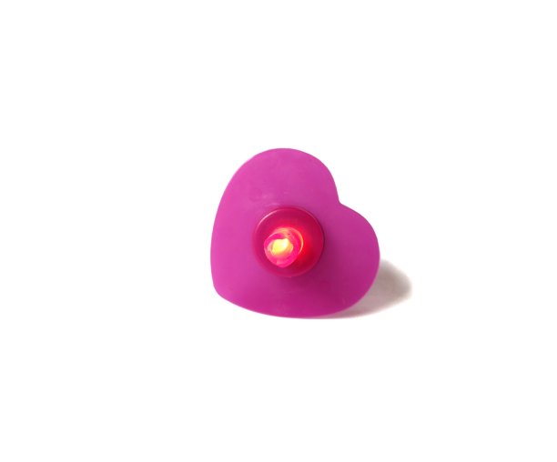 红心符号照亮在白色的背景。情人节的概念图片下载