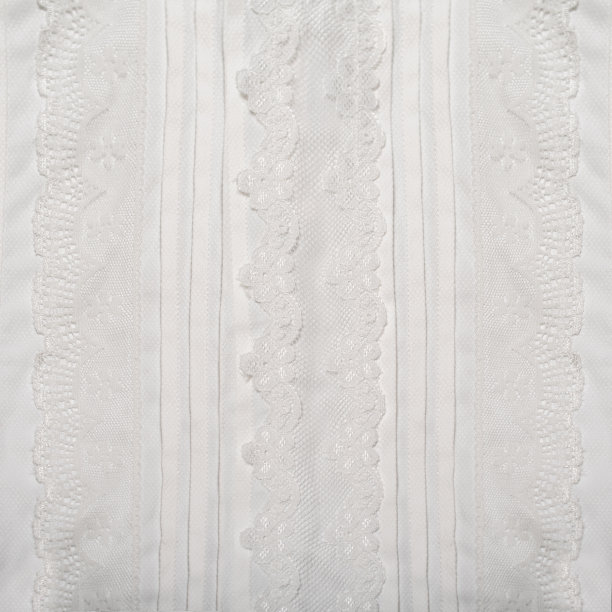 有白色蕾丝插入的衣服的一部分。纹理背景图片下载