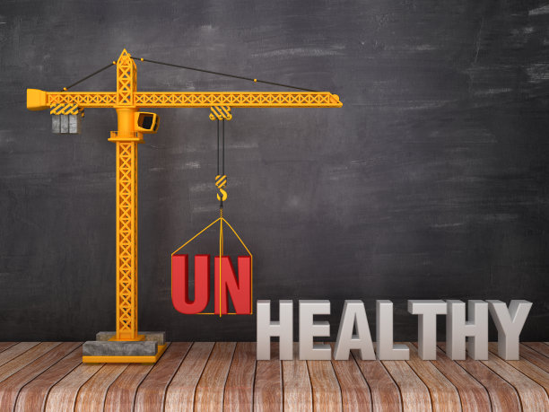 塔吊与不健康/健康的字在黑板背景- 3D渲染图片下载