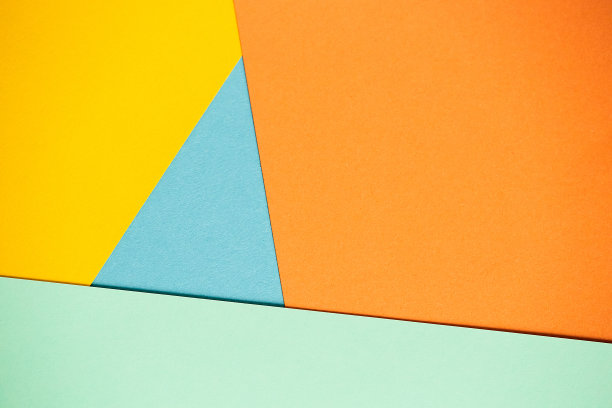 彩色纸张的照片:黄色，橙色，蓝色，绿色。适合设计模板，封面，横幅，报告，抽象，壁纸图片下载