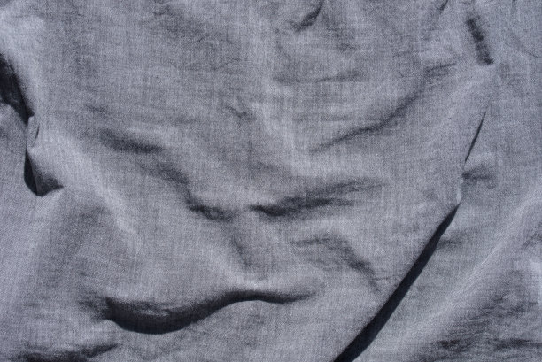 皱褶的灰色纺织品背景纹理图片下载