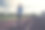 模糊的观点上的跑步女孩在田径比赛。作为背景。田径场上的运动员。图片下载