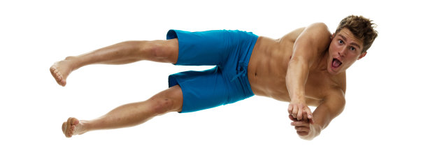 全长/一人/一人/侧视图/侧面视图/看相机20-29岁成年英俊的人棕色头发/短发高加索男性/青年男子游泳/坠落/跳跃/半空中/跳水入水图片下载