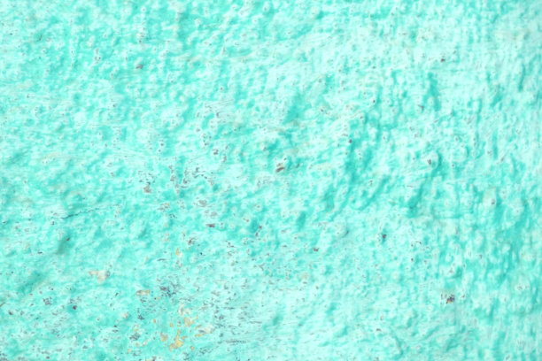 凹凸不平的绿松石涂墙纹理图片下载