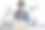 一位坐在笔记本电脑前使用电话语音助手的严肃男士图片下载
