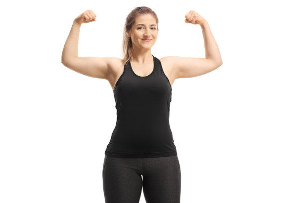 健康的年轻女子微笑着，肌肉发达图片下载