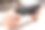 年轻女性汉斯与黑色智能手机观看屏幕。图片下载