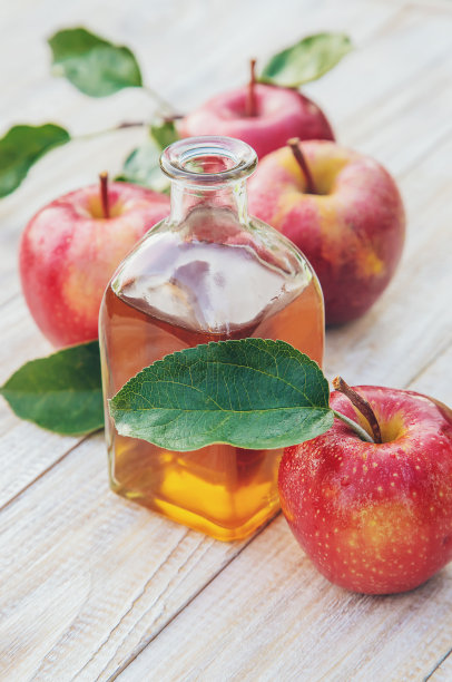 一瓶苹果醋。有选择性的重点。图片下载