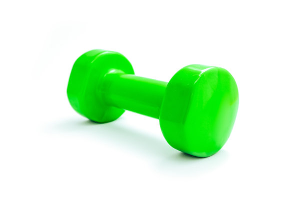 一个绿色哑铃，孤立在白色背景上。健身器材，健康生活理念。图片下载