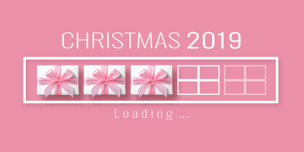 装载条与礼品盒在粉红色的孤立背景。图片下载