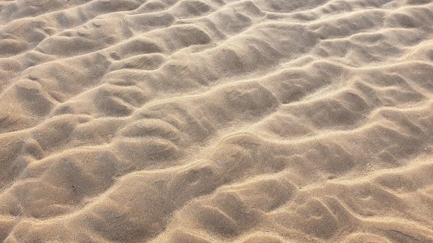 沙滩上沙子的纹理图案图片下载