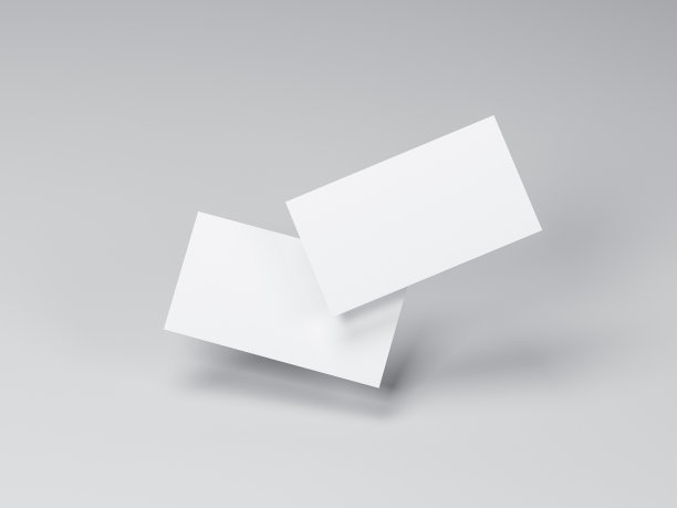 两张白色名片模型在灰色工作室飞行图片下载