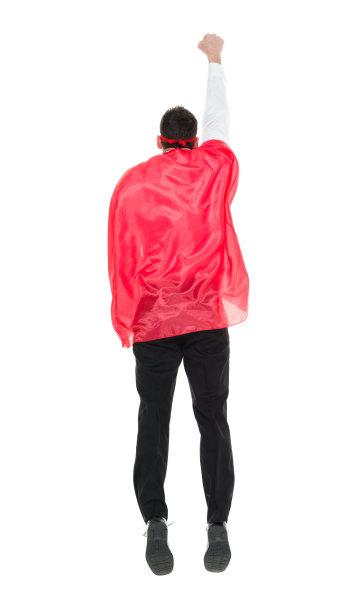 全身/一人/一人/后视图30-39岁英俊的人白人男性/中年成年男子/中年商人/商人/经理/超级英雄/英雄飞行/跳跃/在白色背景前的半空中图片下载