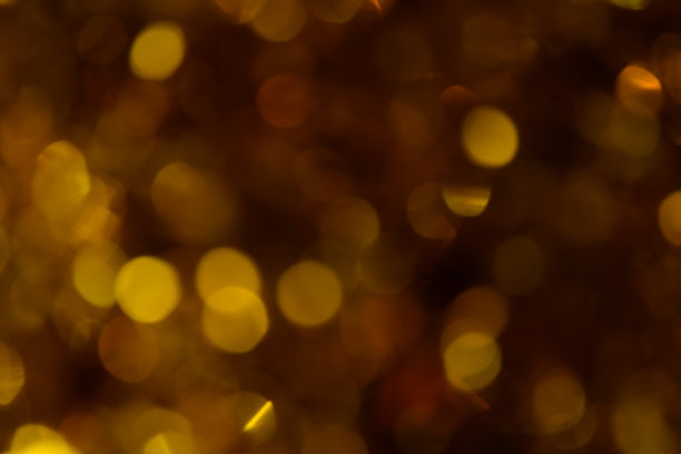散景。节日的背景。圣诞灯。闪闪发光。散焦蓝宝石。新年的背景。节日的壁纸。眨眼。狂欢节。金属丝。散景复古风格照片。金。黄金。图片下载