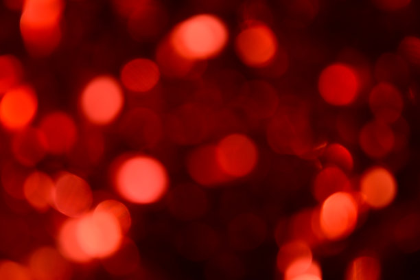 散景。节日的背景。圣诞灯。闪闪发光。散焦蓝宝石。新年的背景。节日的壁纸。眨眼。狂欢节。散景复古风格照片。红色的。图片下载