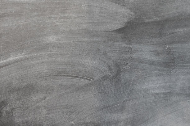 粉笔擦在黑板背景上图片下载