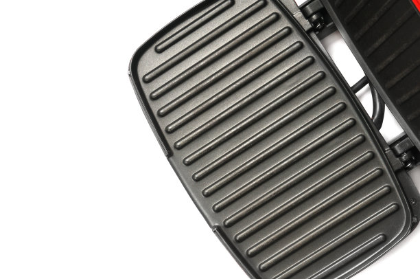 家用电烤架，白色背景图片下载