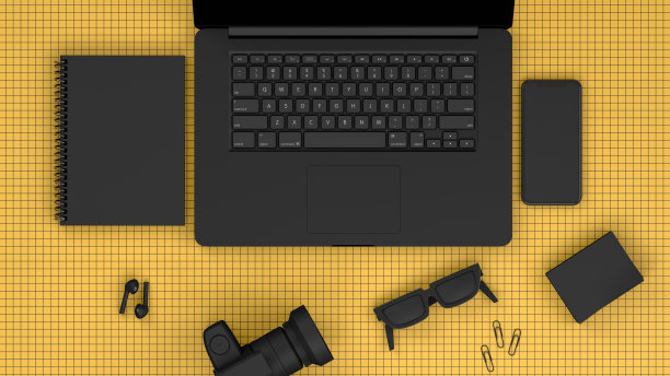 顶视图黄色网格工作与黑色笔记本电脑，技术理念概念图片下载