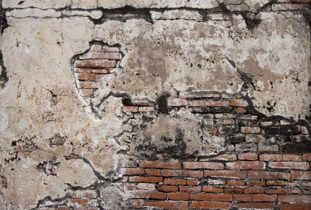 墙的背景是旧的水泥砖，有橙红色的许多水平块，很漂亮。图片下载