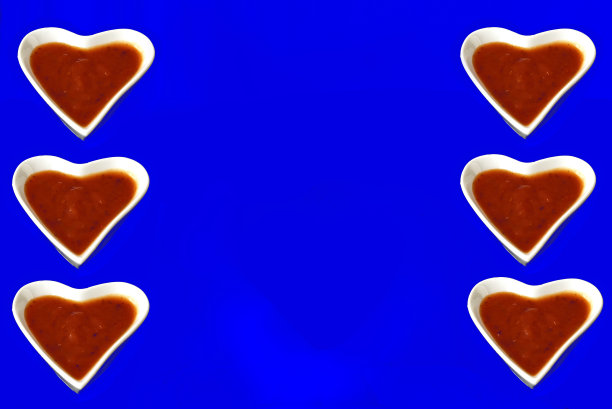 心形碗，蓝底番茄酱。图片下载