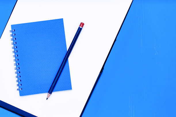 蓝色背景的记事本图片下载