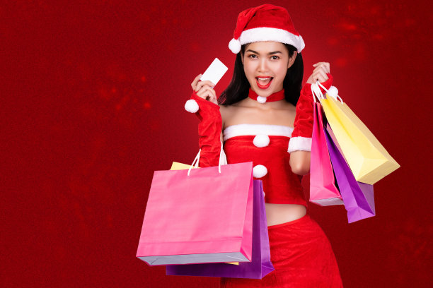 一个穿着圣诞老人的亚洲女人的肖像图片下载