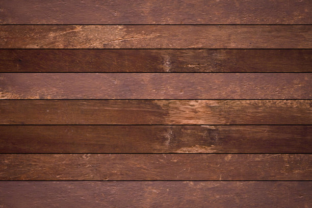 前视图的古老的深棕色木材条纹水平背景纹理与vignettee设计作为展示，推广产品，照片蒙太奇，横幅，广告和网络图片下载