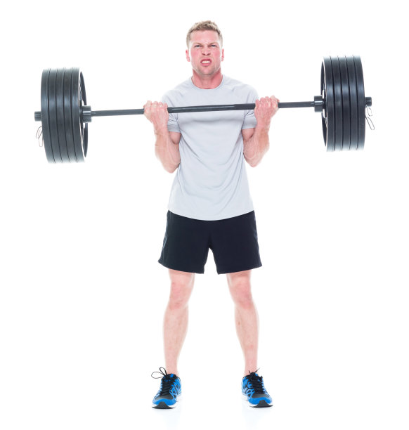 全长/一人/一人/正面20-29岁英俊的人棕色头发/短发白种人男性/年轻男子运动员/运动员锻炼/站在白人背景/重图片下载