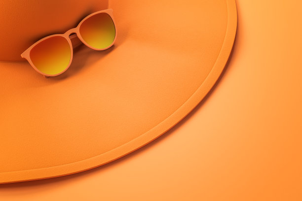 橙色帽子和太阳镜图片下载