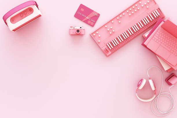 笔记本电脑周围都是粉色背景的彩色小玩意儿。三维渲染图片下载