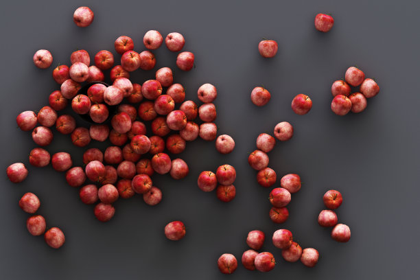 灰色背景上有很多苹果。三维渲染图片下载