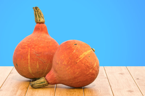 北海道南瓜特写3d渲染与现实的纹理在木桌上图片下载