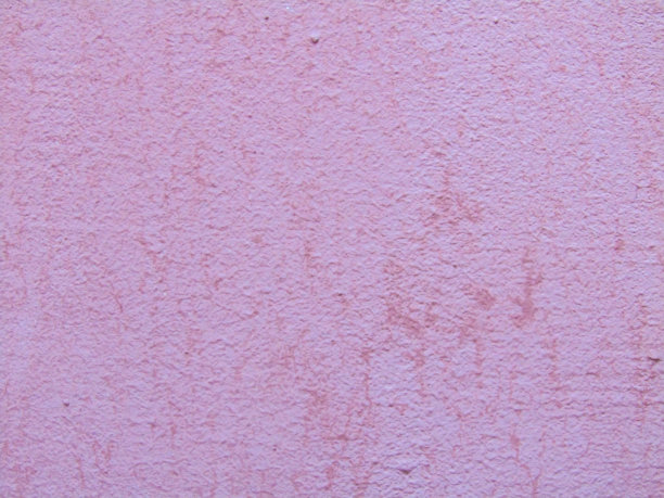 纹理墙漆成紫罗兰色。库存图片图片下载