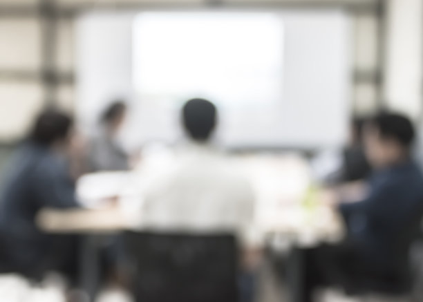 模糊办公室会议背景商务人员工作组在会议室的讨论图片下载