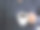 穿着灰色毛衣的女人拿着一杯白色的黑咖啡图片下载
