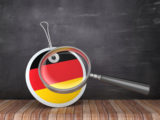 德国国旗价格标签与放大镜在黑板背景- 3D渲染图片下载
