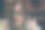 近距离的照片积极开朗的棕色头发女孩在针织套头衫拿小说书享受她快乐的圣诞节庆祝感到满足在满屋子的新年圣诞装饰灯室内图片下载