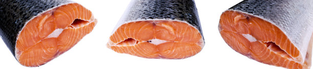 一套新鲜的鲑鱼排孤立在白色的背景。鲑鱼红鱼排。一大堆鳟鱼排。大的有机鲑鱼排排着。大块生鲑鱼。图片下载
