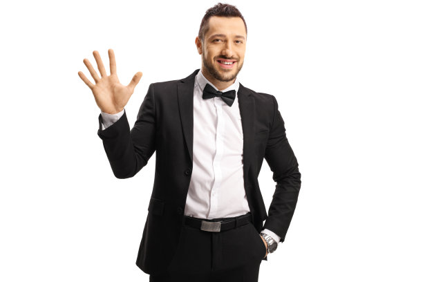 一个穿着西装的年轻人，五指不离手图片下载