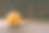 特写照片的小雕刻南瓜在黑暗的木制背景与烟出来的眼睛和嘴图片下载