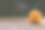 特写照片的小雕刻南瓜在黑暗的木制背景与烟出来的眼睛和嘴图片下载