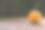 特写照片的小雕刻南瓜在黑暗的木制背景与烟出来的眼睛和嘴图片下载
