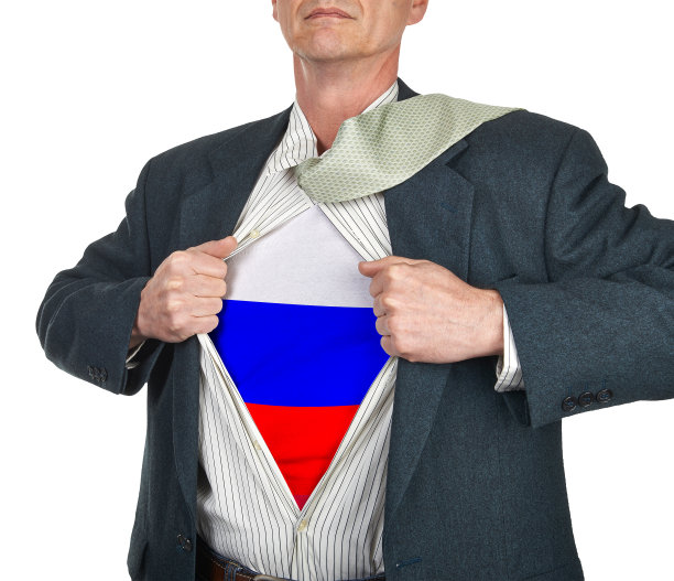 商人在他的衬衫下面展示旗帜超级英雄的衣服图片下载