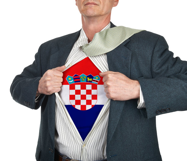 商人在他的衬衫下面展示旗帜超级英雄的衣服图片下载