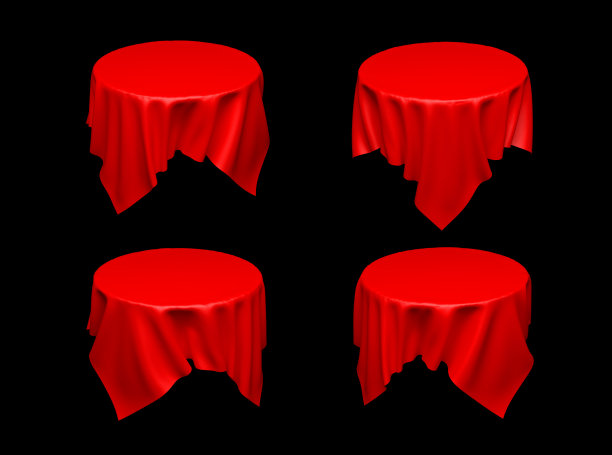 看不见的圆桌上铺着红色桌布。一套不同的布在黑色的背景图片下载