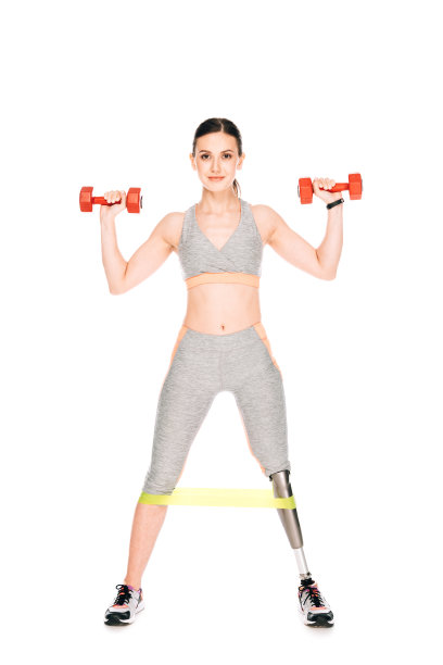 全身长度的残疾女运动员与阻力带和哑铃孤立在白色图片下载