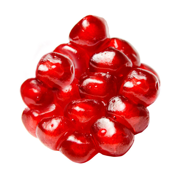 在白色背景上孤立的石榴种子。图片下载