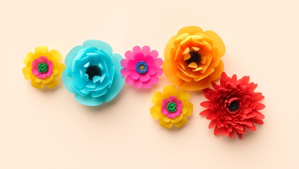 米色背景上的多色纸花图片下载